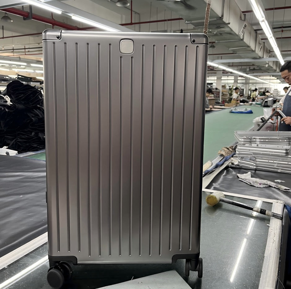 Club Cabin Suitcase in a factory setting